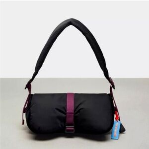 Coachtopia Black and purple grape puffer loop purse. used once, extremely cute.